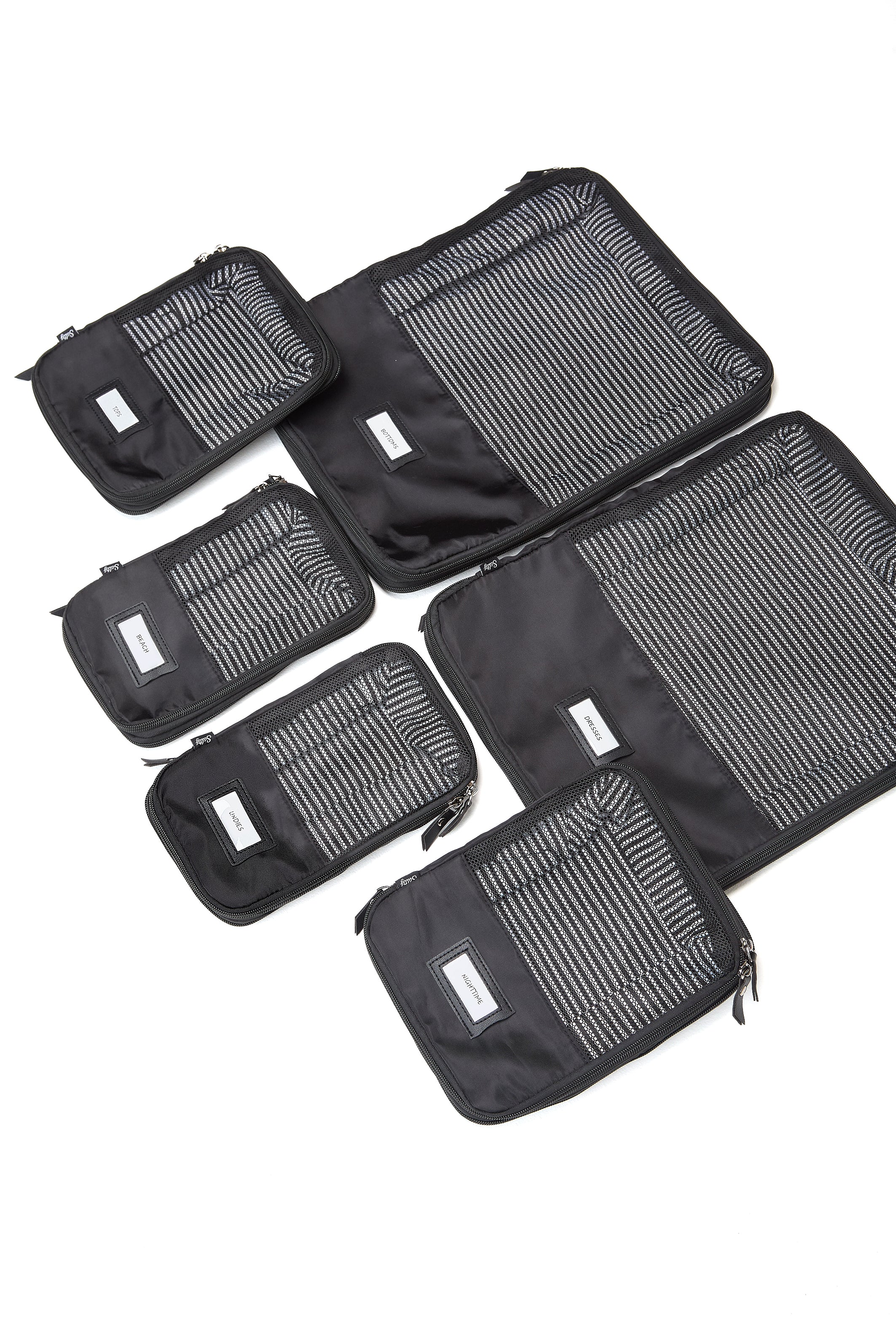 Sleek black packing cubes perfect for carry-on and checked luggage