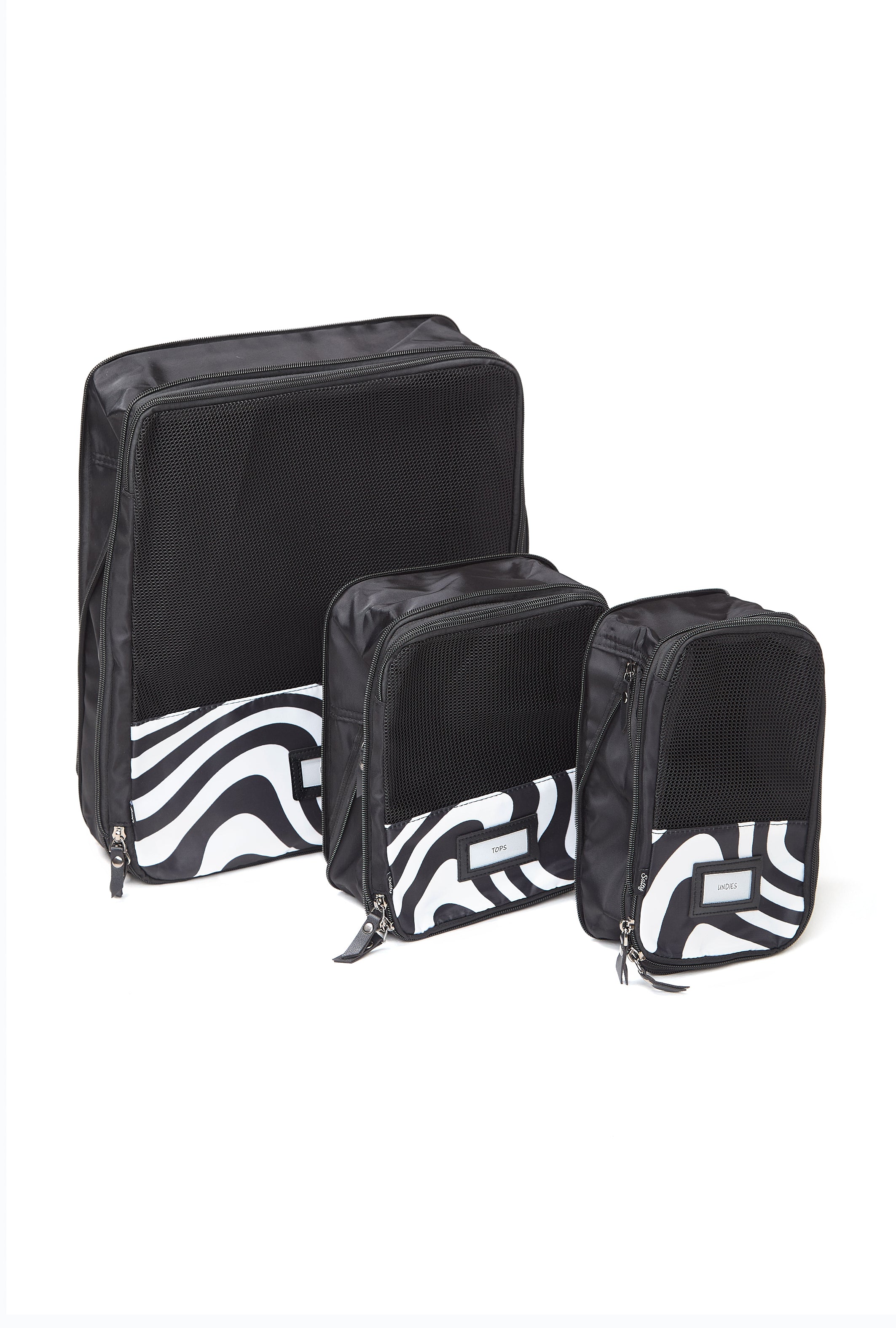 Zipper detail on black and white patterned packing cube