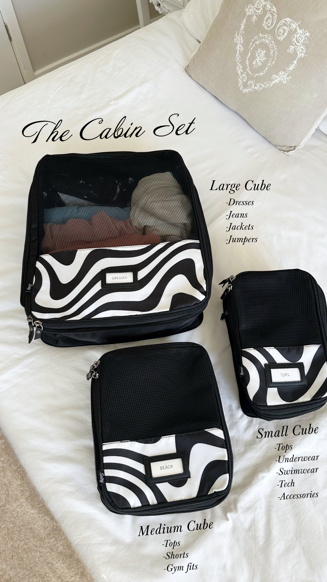 Sleek travel cube in distorted lines print with space-saving design